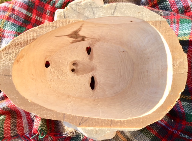 wooden mask of an grandma