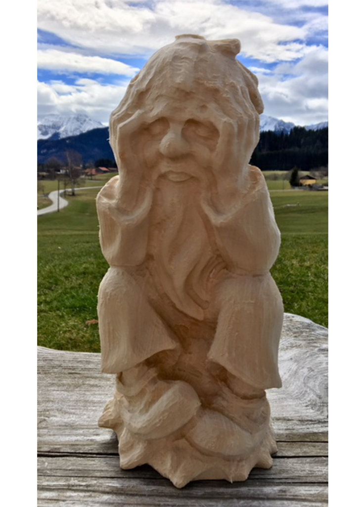 Denker Opa, aus Holz geschnitzt