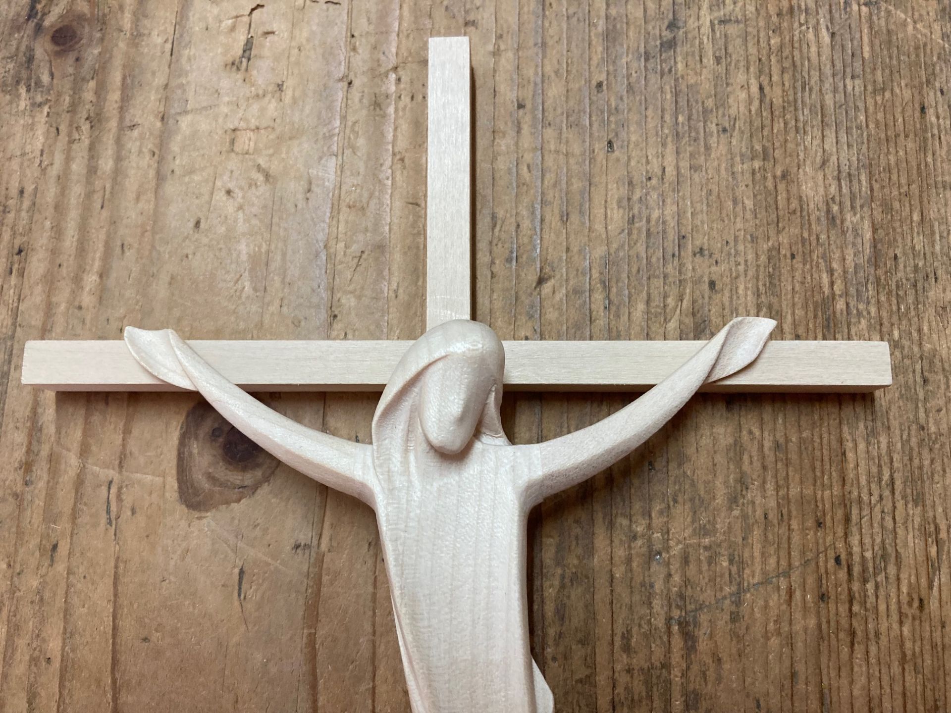 modern Jesus on cross, woodcarved in marpel-tree
